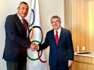 Einars Fogelis and Dr. Thomas Bach Einars Fogelis and Dr. Thomas Bach